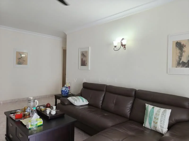Living features: 3-seater leather sofa in brown, coffee table, framed artwork on walls, wall-mounted sconce lighting, cream painted walls, marble flooring, ceiling fan, decorative cushions on sofa; style: contemporary.