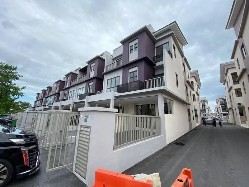 Exterior type: linked terrace house; features: white painted facade, purple accent wall, flat roof, two-storey structure, balconies with railings, manicured landscaping, driveway with interlocking pavers, surrounded by mature greenery, modern architectural design; style: modern.