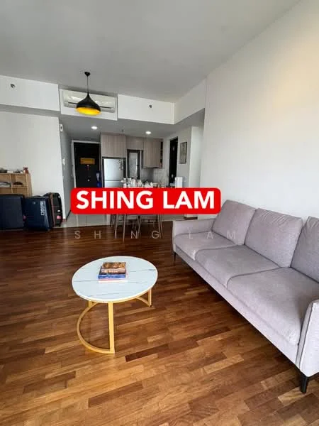 Living features: light wood flooring, grey fabric sofa, round coffee table with white top and gold base, wall-mounted air conditioning unit, pendant light fixture, open layout to kitchen, large window with natural light, decorative wall art; style: modern.