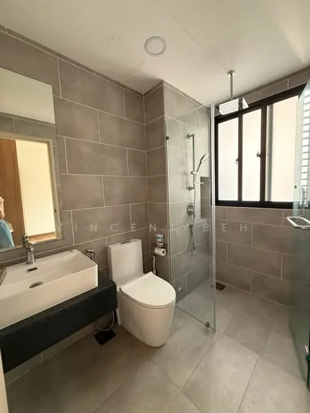 Bathroom features: grey ceramic tile flooring, grey wall tiles, glass shower enclosure, rain shower head, handheld shower, single-sink vanity with black cabinet, chrome basin mixer, framed mirror, one-piece toilet, window with vertical bars; style: modern.