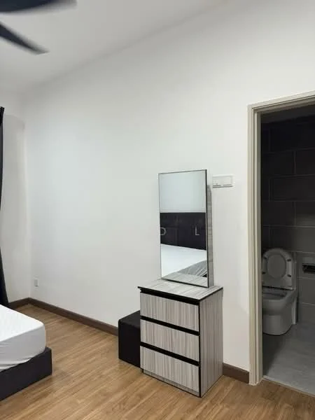 Bedroom features: white painted walls, wooden flooring, queen-size bed, mirror on dresser, black dresser, ceiling fan, doorway to bathroom, toilet visible through doorway; style: modern.