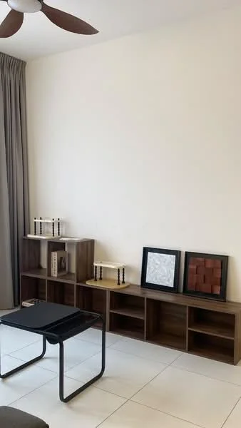 Living features: light grey walls, white tiled flooring, 5-blade ceiling fan, black coffee table, wooden shelving unit, decorative wall art, curtains, open shelving, decorative books, neutral color palette; style: modern.