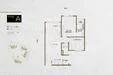 Floor plan: 2-bedroom 1-bathroom unit; features: open-plan kitchen-dining-living, master bedroom with ensuite bathroom, bedroom 2 with shared bathroom, balcony off living room, utility room, laundry area, central foyer.