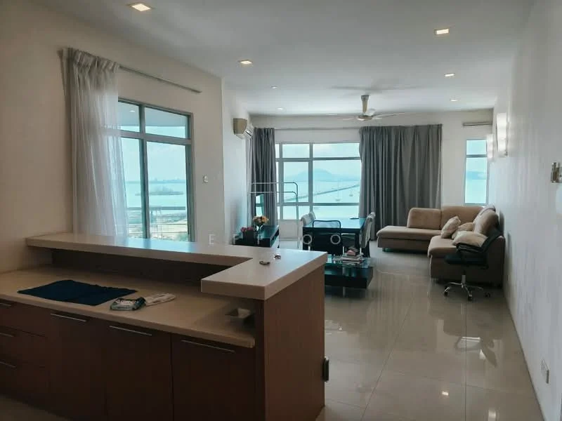 Living features: floor-to-ceiling windows, beige fabric sofa, coffee table, TV console, recessed downlights, cream painted walls, polished tile flooring, ceiling fan, curtains, view of the sea; style: modern; view: sea. Kitchen features: kitchen island, light wood cabinetry, countertop with integrated sink, stainless-steel appliances; style: modern.