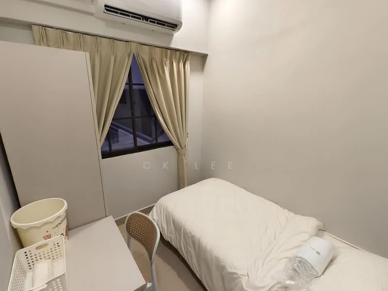 Bedroom features: single bed with white bedding, desk with chair, window with sheer curtains, wall-mounted air conditioning unit, light beige painted walls, light-colored flooring, waste basket, decorative throw pillow; style: minimalist.