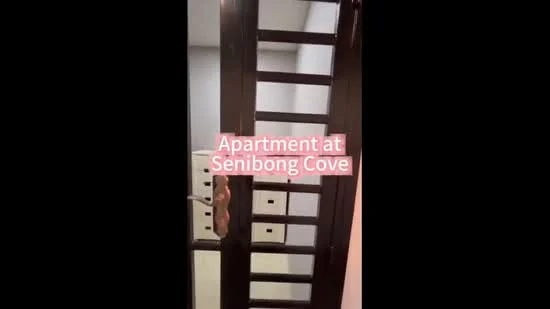Room features: wooden door with glass panels, metal handle, mailboxes, neutral wall color, ceiling lights; style: modern.