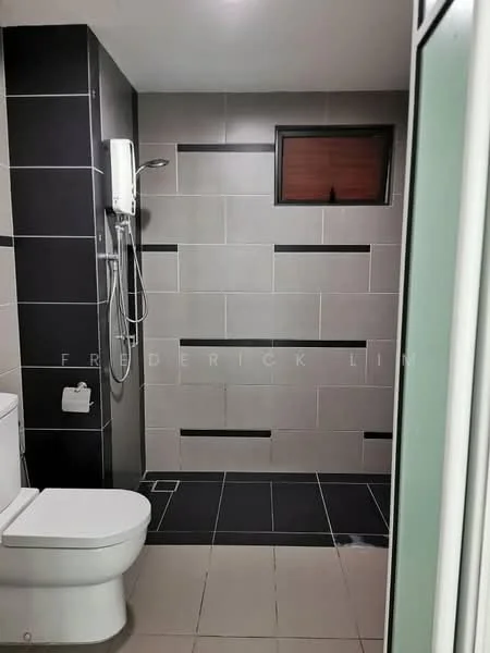 Bathroom features: white toilet, single-sink vanity, chrome basin mixer faucet, walk-in shower with glass enclosure, rain shower head, tile cladding on walls, black and grey tile flooring, small window for ventilation, shower wall with black accent tiles, towel holder, mirror above vanity; style: modern.