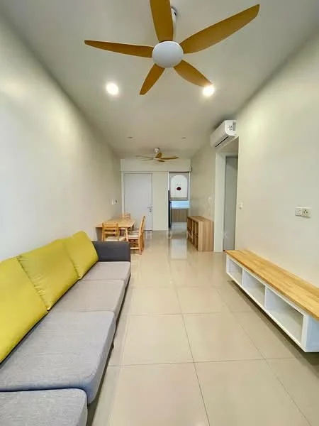 Living features: 3-seater fabric sofa in grey, yellow accent cushions, ceiling fan with 3 blades, wall-mounted air conditioning unit, light-colored tiled flooring, white painted walls, wooden TV console, dining table with chairs, natural light from window, open layout; style: modern.