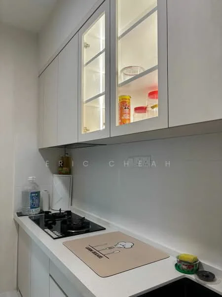 Kitchen features: white cabinetry with glass-front upper cabinets, white countertop, built-in gas hob, kitchen mat, clear glass jars on shelves, plastic containers on shelves, water dispenser, white tiled backsplash, under-cabinet lighting; style: modern.