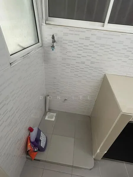 Laundry features: white tiled walls, grey floor tiles, window for natural light, washing machine space, drainage outlet, wall-mounted faucet, cleaning supplies on floor.
