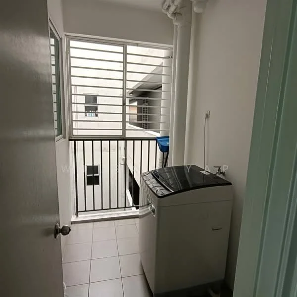 Laundry features: washing machine, grey tiled flooring, white walls, sliding window with metal grille, balcony with railing, outdoor view, light fixture, plumbing connection.