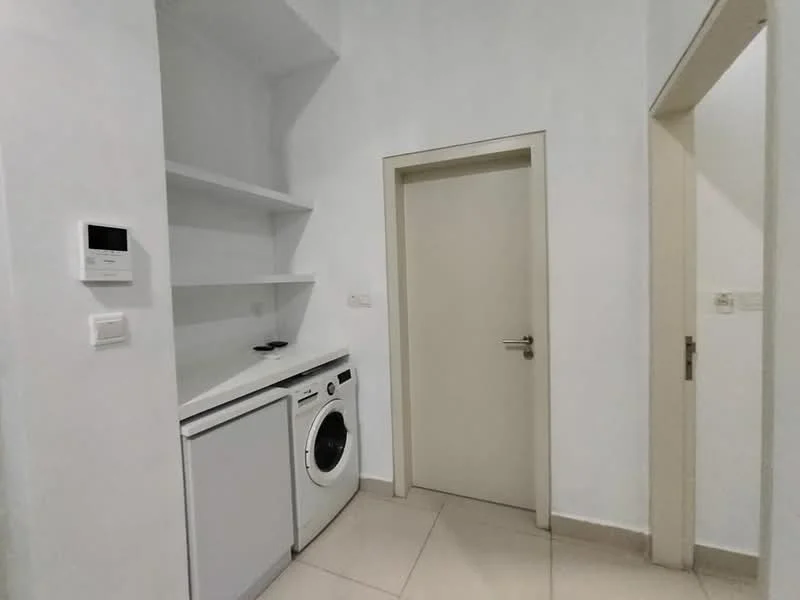 Laundry features: white walls, light-colored tile flooring, built-in shelving, white front-load washing machine, door leading to another room, thermostat control panel; style: modern.