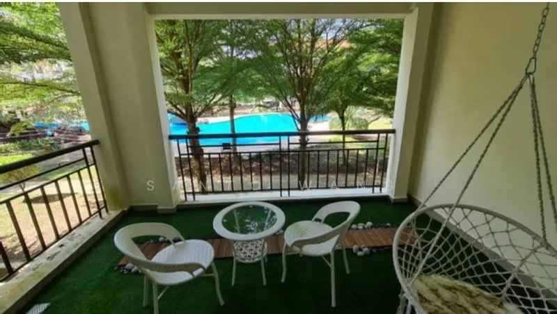Balcony features: hanging chair, white round table, two white chairs, green artificial grass flooring, railings, view of swimming pool, view of landscaped garden; view: pool.