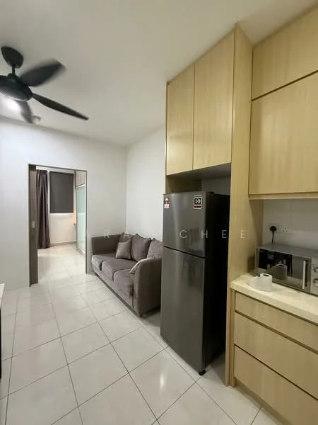 Kitchen features: light-colored cabinetry, stainless-steel fridge, built-in microwave, ceramic tile flooring, 5-blade ceiling fan, countertop with storage below, neutral wall color, open layout to living area; style: modern. Living features: 2-seater fabric sofa in grey, neutral wall color, ceramic tile flooring, natural light from window, open layout to kitchen; style: modern.