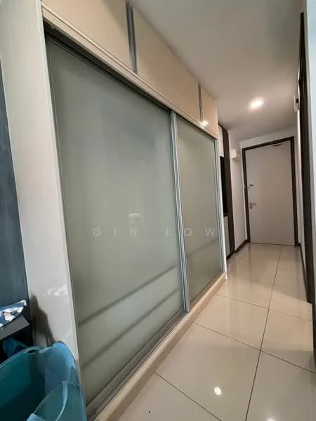 Room features: sliding glass doors, built-in wardrobe with sliding panels, cream-colored cabinetry, glossy tile flooring, neutral wall color, recessed lighting, door leading to another room; style: modern.