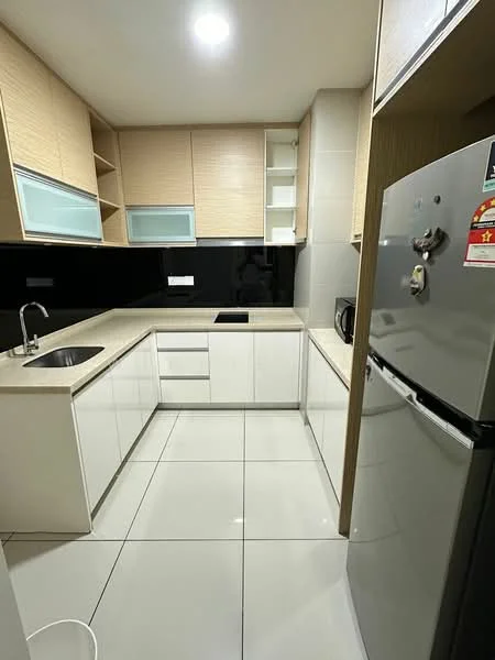 Kitchen features: white cabinetry, light wood upper cabinets, black backsplash, stainless-steel sink, chrome pull-down faucet, countertop with light beige finish, built-in stove, refrigerator, microwave, ceramic tile flooring, recessed downlights; style: modern.