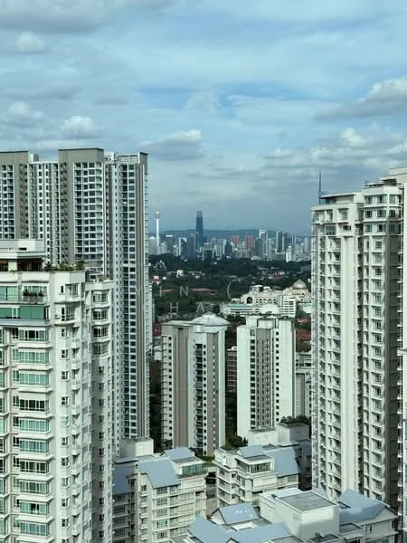 Exterior type: high-rise condominium; features: glass curtain wall, white painted facade, recessed balconies, approximately 20-storey high-rise, surrounded by mature greenery, urban skyline view, multiple high-rise buildings in proximity, modern architectural design; style: modern.