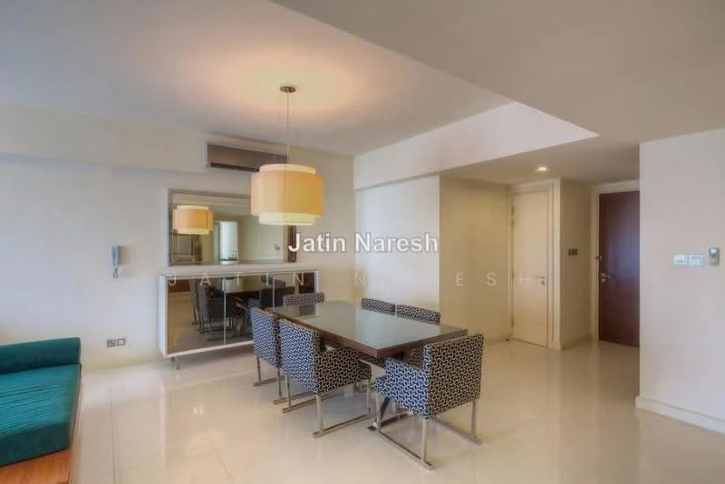 Dining features: rectangular dining table, upholstered dining chairs with patterned fabric, pendant light fixture, mirror on wall, white painted walls, polished tile flooring, air conditioning unit, doorway to hallway; style: modern. Living features: teal fabric sofa, coffee table, wall-mounted TV, open layout, natural light from windows; style: modern.