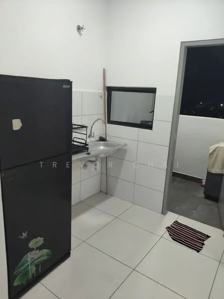 Kitchen features: black fridge, stainless-steel sink, wall-mounted faucet, white tiled walls, grey tiled flooring, window with view, countertop, broom, dish rack, floor mat.