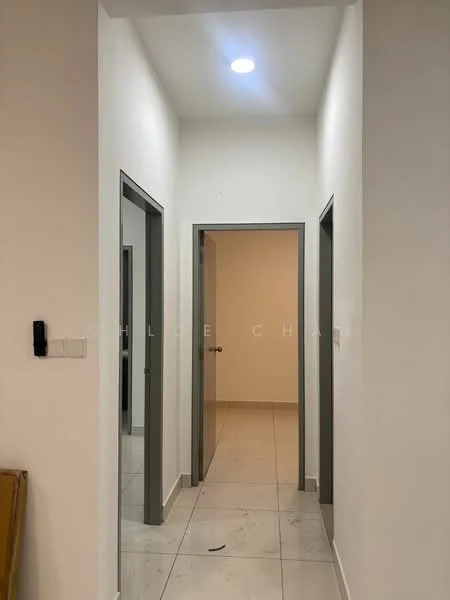 Hallway features: white painted walls, marble tile flooring, recessed ceiling lights, two doorways, one wall-mounted intercom, neutral color scheme; style: modern.