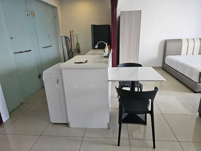 Room features: white cabinetry, single-bowl stainless-steel sink, chrome pull-down faucet, white countertop, black dining table, black dining chairs, tile flooring, bed with upholstered headboard, wall-mounted TV, green decorative items, curtains, light-colored walls; style: modern.