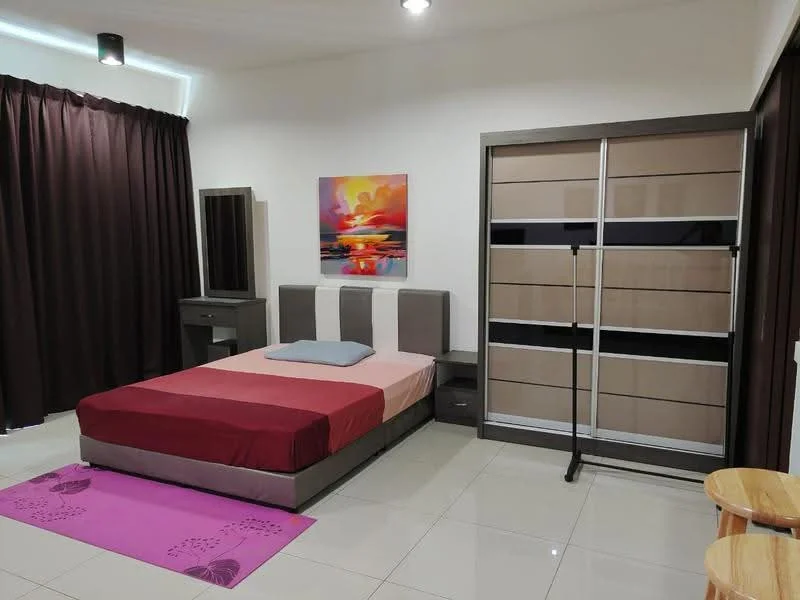 Bedroom features: king-size bed with grey and red bedding, upholstered headboard, two bedside tables, framed artwork on wall, built-in wardrobe with sliding doors, full-length mirror, dark brown curtains, tile flooring, area rug with floral pattern, ceiling light fixture; style: modern.