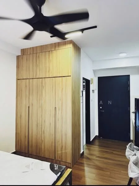 Bedroom features: wooden flooring, built-in wardrobe with wood finish, 5-blade ceiling fan with light, white painted walls, black door, window with natural light, bed frame without mattress, light fixture on ceiling; style: modern.