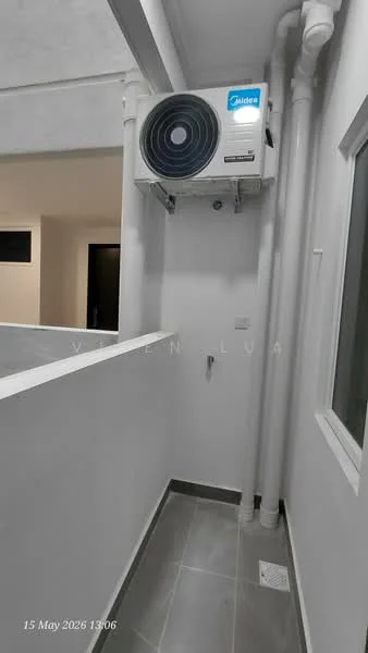 Room features: wall-mounted split AC, white painted walls, grey tile flooring, window with glass pane, exposed pipes, corner space.