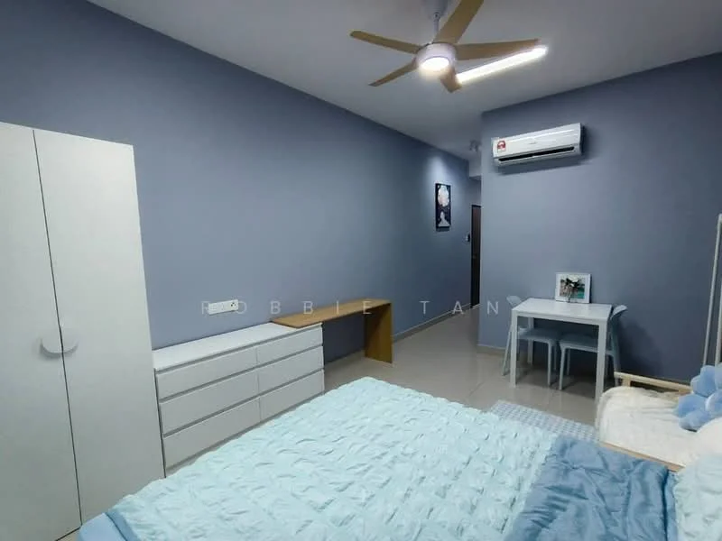 Bedroom features: blue painted walls, wall-mounted split AC, 5-blade ceiling fan with light, queen-size bed with light blue bedding, white bedside table, white dresser with multiple drawers, wooden desk, two white chairs, framed artwork on wall, tile flooring; style: modern.