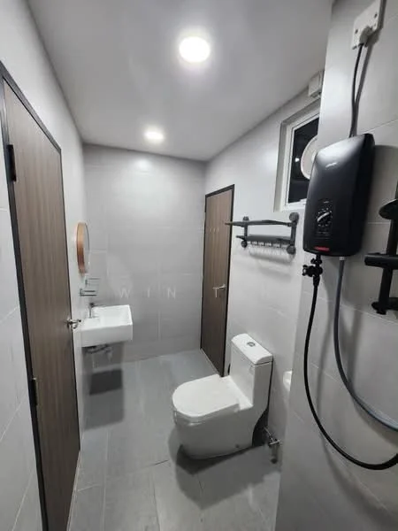 Bathroom features: white tiled walls, grey tiled flooring, single-sink vanity with wood cabinet, chrome basin mixer faucet, one-piece toilet, framed mirror, wall-mounted shower heater, window for natural light, towel rack, door with wood finish; style: modern.