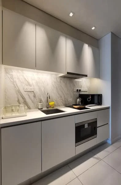 Kitchen features: white cabinetry with flat-panel doors, marble backsplash, stainless-steel sink, chrome pull-down faucet, built-in microwave, built-in oven, countertop with integrated lighting, under-cabinet lighting, white tile flooring, kitchen utensils on countertop, yellow fruit bowl; style: modern.