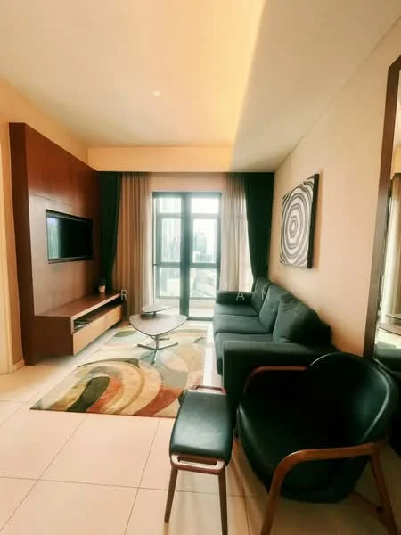 Living features: 3-seater fabric sofa in dark green, coffee table with round top, TV console with built-in storage, wall-mounted TV, area rug with abstract pattern, floor-to-ceiling windows, curtains in neutral color, decorative wall art, light-colored walls, tile flooring; style: modern; view: city.