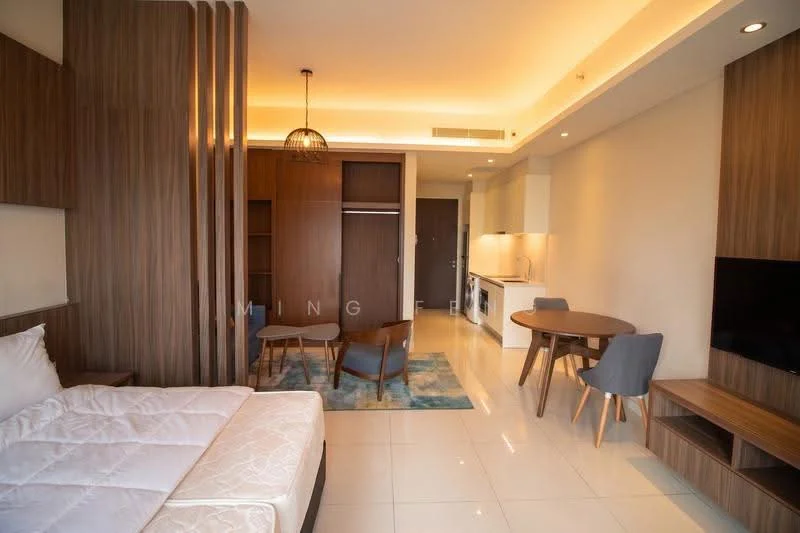 Living features: queen-size bed, wooden feature wall, built-in wardrobe, dining table for 2, 2 upholstered chairs, area rug with geometric pattern, wall-mounted TV, kitchenette with stove, white cabinets, refrigerator, white tiled flooring, recessed ceiling lights, pendant light fixture; style: modern.