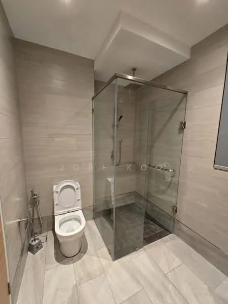 Bathroom features: glass shower enclosure, rain shower head, handheld shower, one-piece toilet, chrome bidet spray, grey tiled walls, light grey floor tiles, recessed lighting, vanity with storage, mirror above vanity; style: modern.