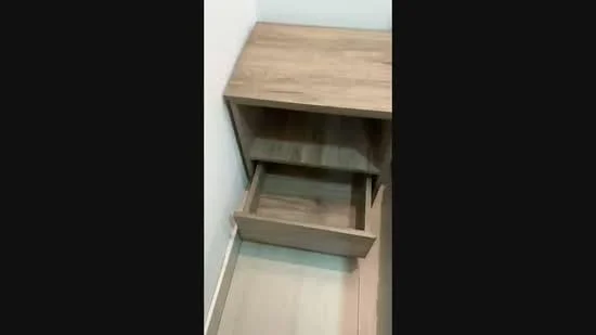 Room features: wooden bedside table, open drawer, light wood finish, minimalist design, smooth surface, no visible hardware, flooring visible, neutral wall color; style: modern.