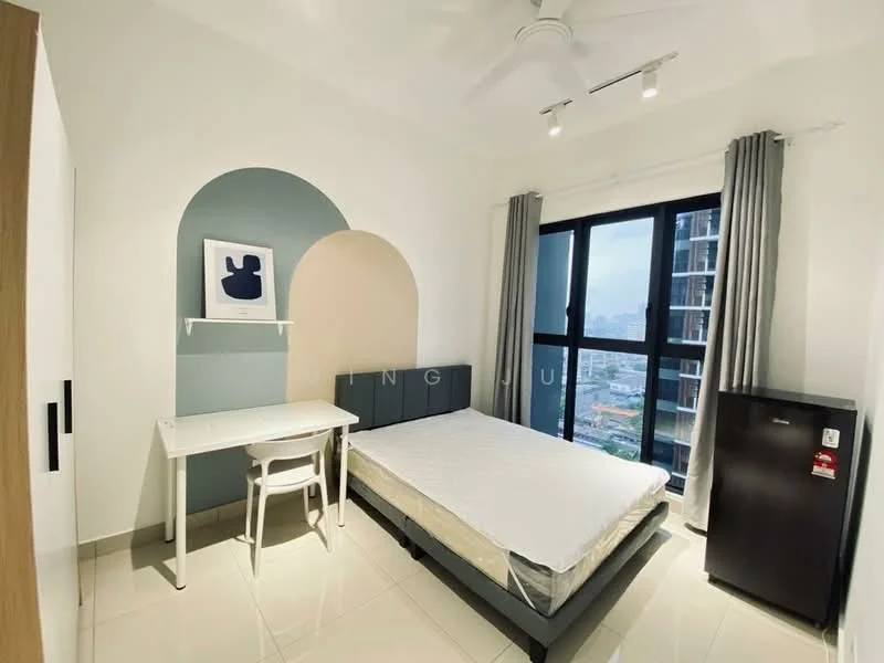 Bedroom features: queen-size bed frame without mattress, white painted walls, accent wall in light blue, floor-to-ceiling windows, grey curtains, white ceiling with recessed downlights, 5-blade ceiling fan, study desk in white, white chair, black fridge, tile flooring; style: modern; view: city.