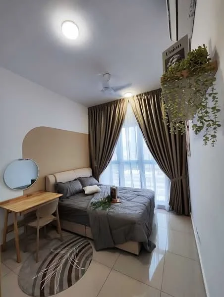 Bedroom features: queen-size bed with upholstered headboard, grey bedding, wooden bedside table, round mirror, ceiling fan, floor-to-ceiling windows, sheer curtains, dark brown curtains, decorative plant hanging, area rug with circular pattern, tile flooring, wall-mounted artwork; style: modern; view: city.
