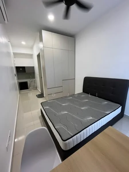 Bedroom features: queen-size bed with grey mattress, black upholstered headboard, white walls, tile flooring, ceiling fan, built-in wardrobe with grey cabinetry, kitchenette area visible, recessed lighting; style: modern.