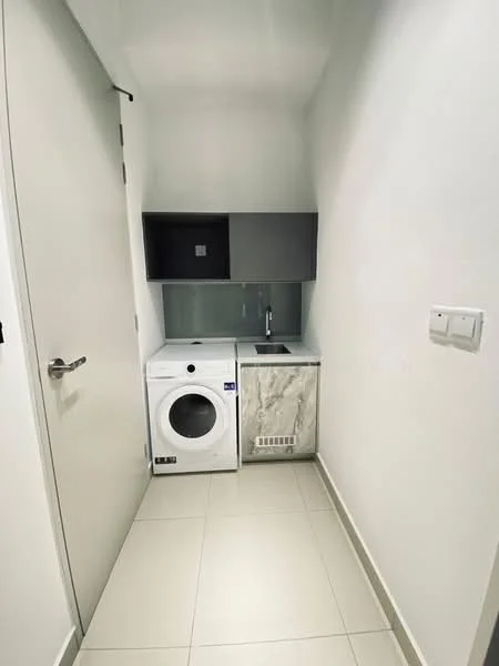 Laundry features: white front-load washing machine, grey cabinetry, marble countertop, sink with chrome faucet, white tiled walls, light grey floor tiles, built-in storage above washer, single wall-mounted cabinet; style: modern.