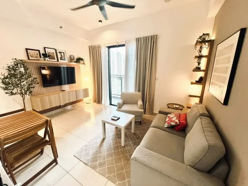 Living features: grey fabric sofa, white coffee table, wooden dining table with folding chairs, wall-mounted TV, decorative wall paneling, floor-to-ceiling windows, sheer curtains, area rug with geometric pattern, indoor plant, ceiling fan with light, wall-mounted shelves with decor; style: modern; view: city.