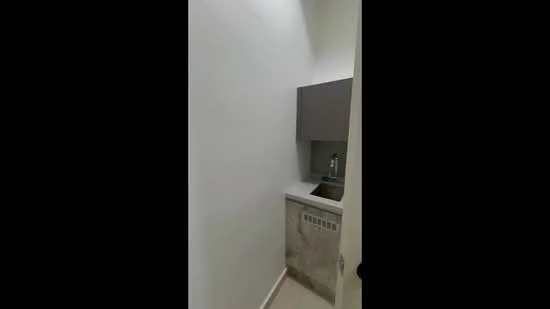 Room features: white painted walls, light-colored cabinetry, sink, countertop, tile flooring; style: modern.