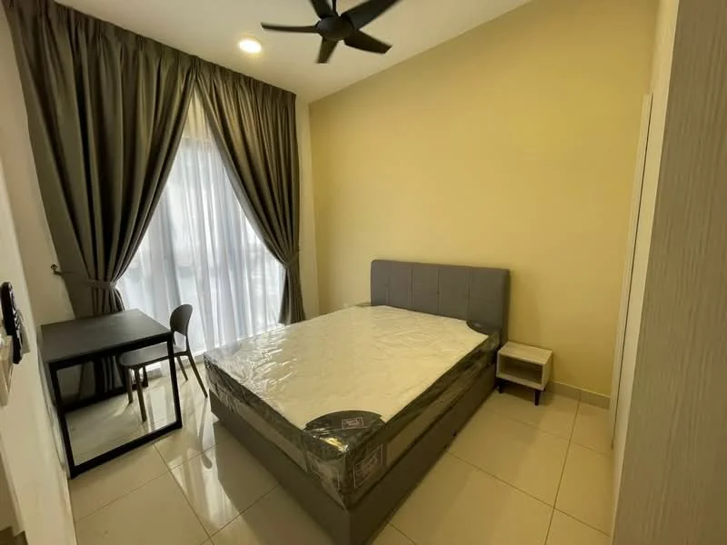 Bedroom features: queen-size bed with grey upholstered headboard, white bedding, grey bedside table, black study desk, black chair, floor-to-ceiling window with sheer curtains, dark brown curtains, white walls, tile flooring, ceiling fan with light; style: modern.
