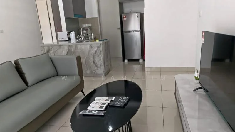 Living features: grey fabric sofa, round black coffee table, wall-mounted TV, white TV console, ceramic tile flooring, recessed downlights, open layout to kitchen, decorative items on coffee table; style: modern. Kitchen features: stainless-steel fridge, grey cabinetry, marble countertop, built-in sink, microwave, kitchen appliances visible; style: modern.