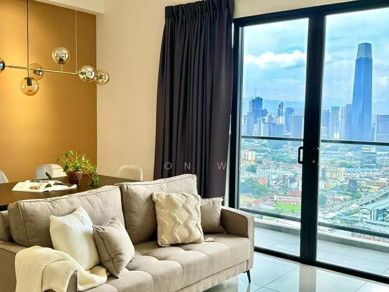 Living features: 3-seater fabric sofa in light grey, decorative throw pillows, pendant light fixture with multiple bulbs, floor-to-ceiling windows, curtains in dark grey, city skyline view, coffee table, area rug; style: modern; view: city.