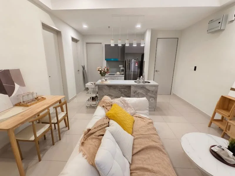 Living features: white painted walls, tile flooring, 5-blade ceiling fan with light, sofa with white upholstery, yellow throw pillow, coffee table, decorative vase with flowers, area rug, dining table with wooden surface and white chairs, kitchen island with marble countertop, refrigerator visible in background, kitchen cabinetry in blue, wall-mounted air conditioning unit; style: modern.