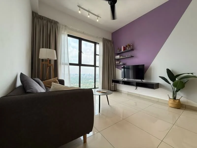 Living features: grey fabric sofa, round coffee table, wall-mounted TV, black TV console, floor-to-ceiling windows, sheer curtains, purple accent wall, white painted walls, recessed downlights, ceiling fan, decorative plant in pot, shelves with decorative items; style: modern; view: city.