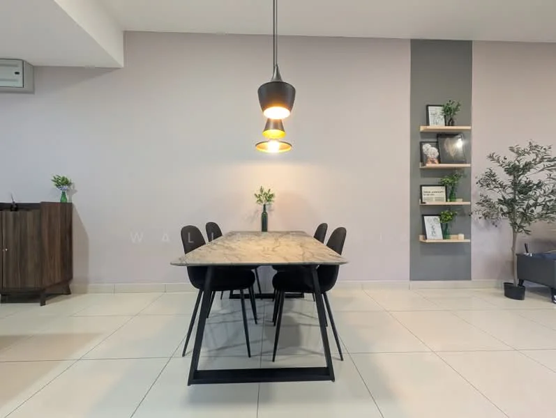 Dining features: rectangular dining table with marble top, 6 black dining chairs, pendant light fixture with three bulbs, light grey painted walls, dark grey accent wall, decorative wall shelves with plants and decor items, large potted plant, white tiled flooring; style: modern.