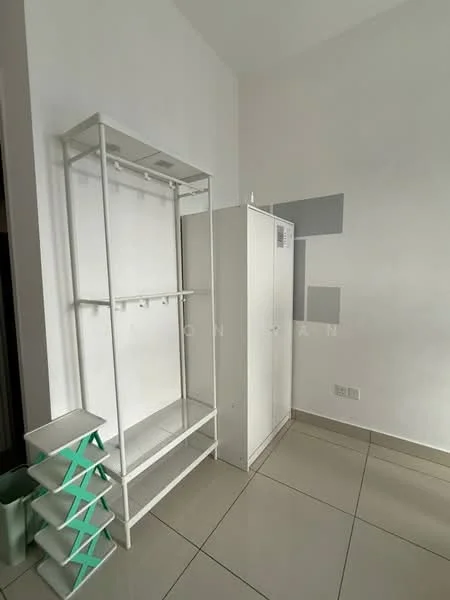 Room features: white painted walls, grey accent wall, glossy tile flooring, open clothing rack, white wardrobe, green storage bins, minimalist design; style: modern.