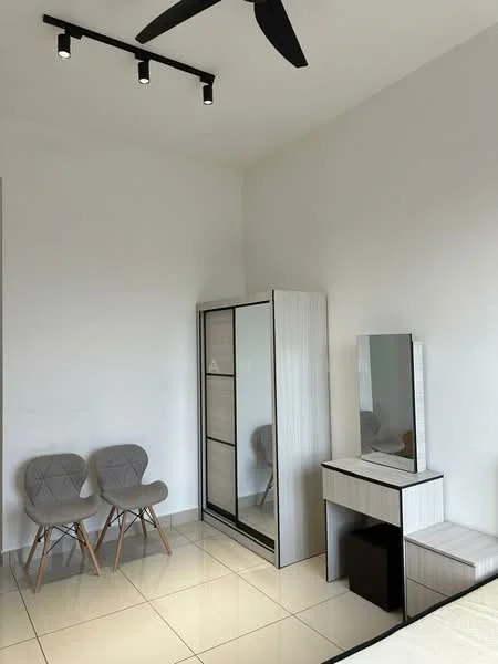 Bedroom features: white painted walls, glossy tile flooring, 5-blade ceiling fan with light, built-in wardrobe with sliding doors, dressing table with mirror, two grey upholstered chairs, small black storage unit; style: modern.