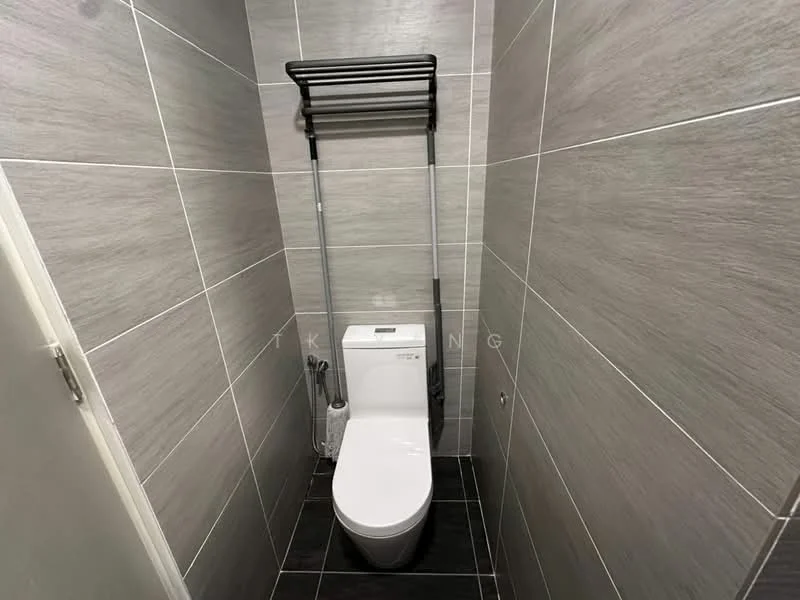 Bathroom features: one-piece toilet, grey tiled walls, black tiled flooring, toilet paper holder, wall-mounted toilet brush holder; style: modern.